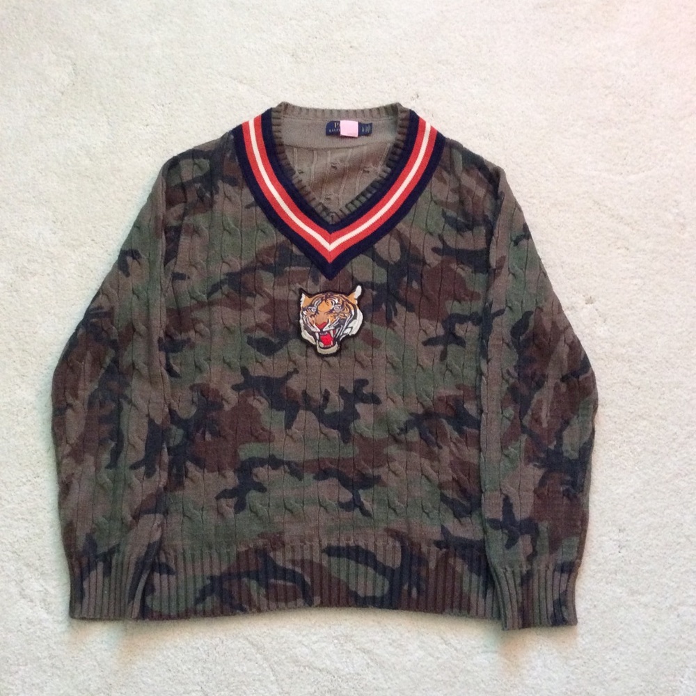 Ralph Lauren sweater with tiger head on the front.